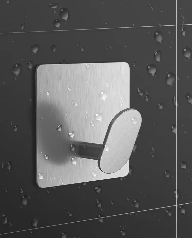 Crochet adhésif pour serviettes vêtements et accessoires